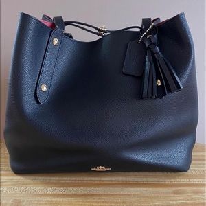 Large black and red coach tote